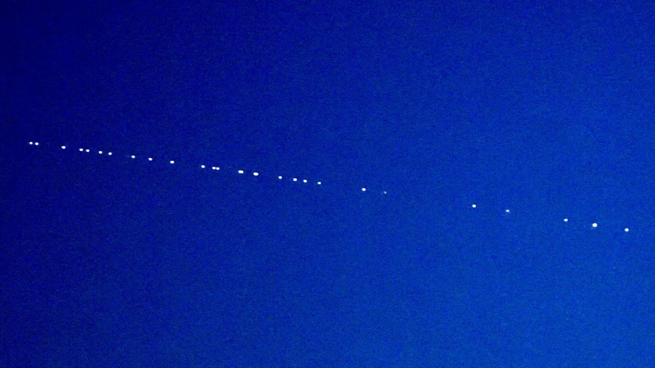 SpaceX Starlink satellite train at dusk