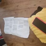 Celular, anotações e folhas do caderno de resposta foram apreendidas